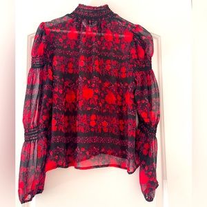 Beautiful, sheer blouse. Never worn but no tag. Perfect condition. Size S.